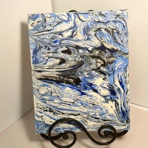 One of a kind, signed paint pour picture. Dark blue, lt blue, white, black. 8x10